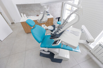 Modern Dental office. equipment at dental office. Dental chair and other accessories. Dental clinic equipment.