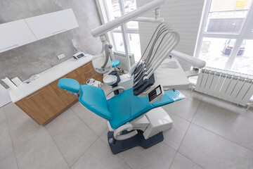 Modern Dental office. equipment at dental office. Dental chair and other accessories. Dental clinic equipment.