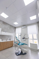 Modern Dental office. equipment at dental office. Dental chair and other accessories. Dental clinic...