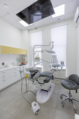 Modern Dental office. equipment at dental office. Dental chair and other accessories. Dental clinic equipment.