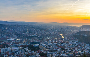Tbilisi at sunrise panoramic view from Mtatsminda Mountain © ssmalomuzh