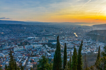 Tbilisi at sunrise panoramic view from Mtatsminda Mountain © ssmalomuzh