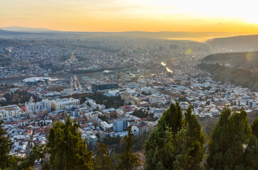 Tbilisi at sunrise panoramic view from Mtatsminda Mountain © ssmalomuzh