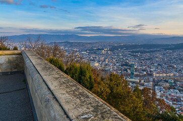 scenic view of Tbilisi at sunrise from Mtatsminda mountain viewpoint  © ssmalomuzh