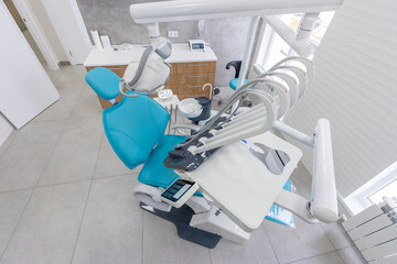 Modern Dental office. equipment at dental office. Dental chair and other accessories. Dental clinic equipment.