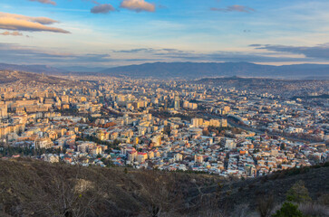 Tbilisi at sunrise panoramic view from Mtatsminda Mountain © ssmalomuzh