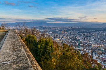 scenic view of Tbilisi at sunrise from Mtatsminda mountain viewpoint 