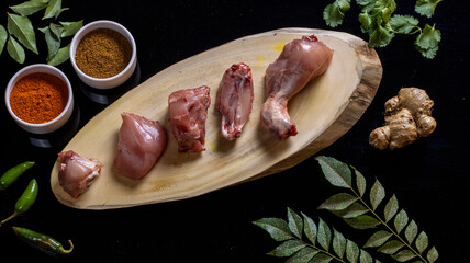 raw chicken is getting ready to be cooked 