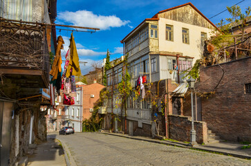 hanging cloves on traditional Georgian houses on the street in Avlabari district of Tbilisi, Georgia