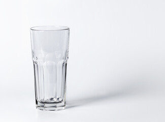 Empty transparent glass for various drinks, for water. White background isolated. Copy space.