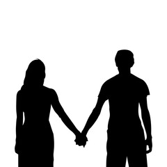 silhouette of a backside teenage couple holding hands