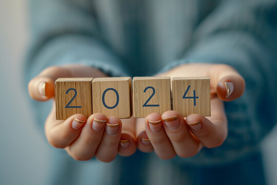 girl hand hold close up wooden block number 2024 happy new year generate ai