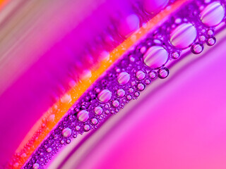 Close up soap bubble on water led light background
