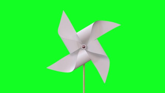 Paper windmill spin on green screen background
