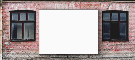 Commercial billboard with mockup space on antique building facade with shabby wall from red brick,...