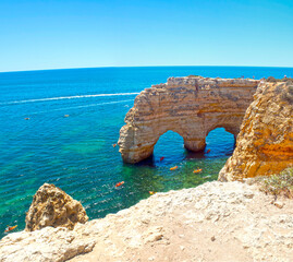 View of the Marina Beach arches (Praia da Marinha) in Lagoa, Faro District, Algarve, Southern Portugal.