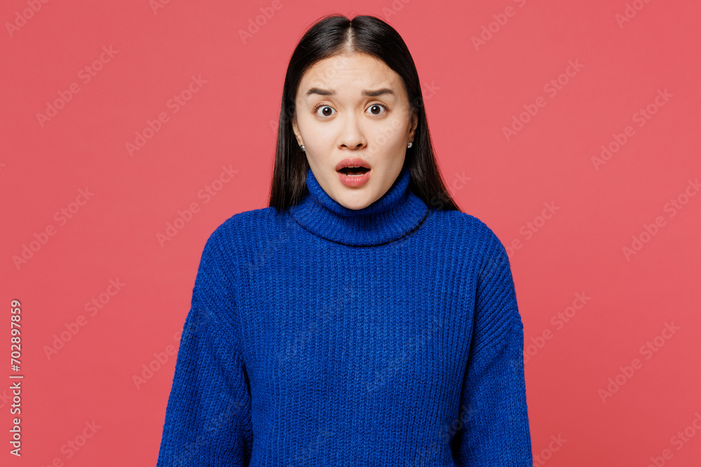 Wall mural Young shocked frightened sad woman of Asian ethnicity she wears blue sweater casual clothes look camera with opened mouth isolated on plain pastel pink background studio portrait. Lifestyle concept. - Wall murals