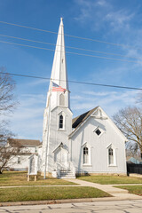 The Dwight pioneer gothic church, built in 1857, in the morning sun.  Dwight, Illinois, USA.