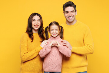 Young parents mom dad with child kid girl 7-8 years old wear pink knitted sweater casual clothes...