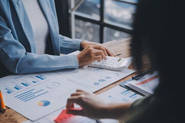 Co working conference, Business team meeting present, investor colleagues discussing new plan financial graph data on office table with laptop and digital tablet, Finance, accounting, investment.