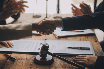 Good service cooperation, Consultation of Businesswoman and Male lawyer or judge counselor having team meeting with client, Law and Legal services concept.