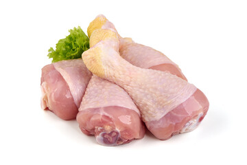 Raw chicken drumsticks, isolated on white background.