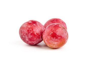 Red plum fruits, isolated on white background.