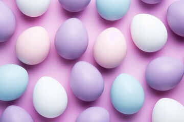 Top view photo of pastel Easter eggs on a pink background - obrazy, fototapety, plakaty