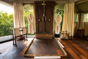 Interior of a luxury room in an expensive lodge, Olare Motorogi Conservancy, Kenya. - obrazy, fototapety, plakaty