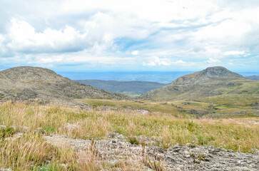 Mountains in the state of Minas Gerais in Brazil. This region is inland and is called Lapinha da Serra and is part of the mountain range called Espinhaco. This mountain range is made up of high peaks,