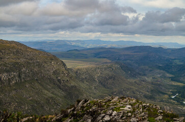Naklejka premium Mountains in the state of Minas Gerais in Brazil. This region is inland and is called Lapinha da Serra and is part of the mountain range called Espinhaco. This mountain range is made up of high peaks,
