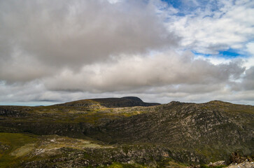 Mountains in the state of Minas Gerais in Brazil. This region is inland and is called Lapinha da Serra and is part of the mountain range called Espinhaco. This mountain range is made up of high peaks,