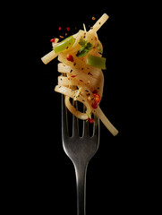 Pasta recipe, close-up of a fork with a mouthful of appetizing pasta wrapped around it. Generative ai