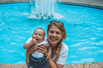 a happy mother with her happy baby