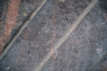 Close up of granite stone texture background. Natural rough stone texture background. Rock texture.