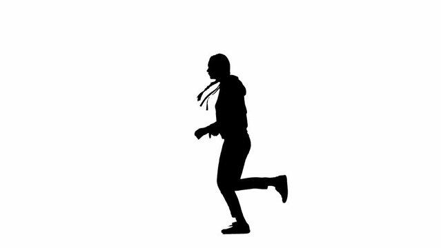 Black silhouette of a woman on a white isolated background. A young girl runs, fearfully looking around, fleeing faster from danger. Side view.