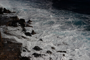 Wave splash on the cliff 