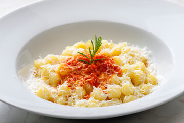 gnocchi with tomato sauce and parmesan cheese
