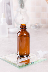 Hyaluronic moisturizing serum on the bathroom shelf.