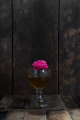 Flower in a fish bowl glass