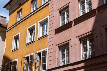 Exploring the Facade of an Old European Building, Bursting with Vibrant Colors
