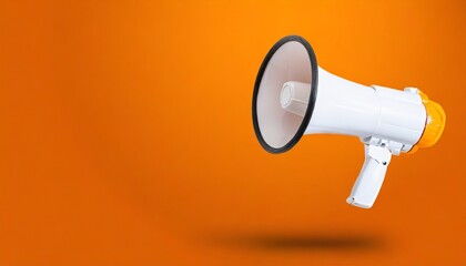 white megaphone or bullhorn floating over orange background business announcement or communication concept with copy space - obrazy, fototapety, plakaty