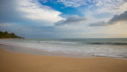 Fototapeta na wymiar beach wave tropic beach sand cloud sky vocation