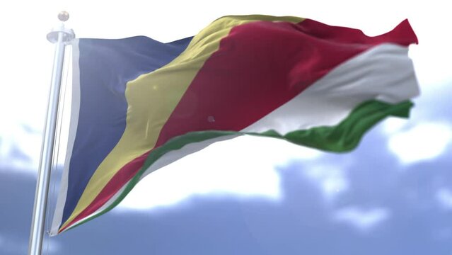 Seychelles flag waving against the sky. High quality 4k footage