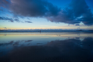 The evening's Famara Beach (Playa de Famara) -  popular surfing beach in Lanzarote. Canary Islands. Spain.