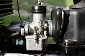 Repair of an old motorcycle. Disassembly of the carburetor. Internal parts of the motor.