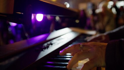 Playing piano at a live concert