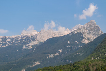 Panoramic view of mount Vrh Jerebceve police and Monte Forato seen from Bovec, Julian Alps, Slovenia Jagged contours of majestic mountain peaks in Soca valley. Wanderlust hiking in wild Slovenian Alps