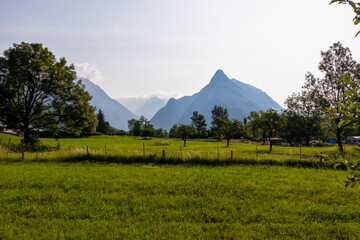 Panoramic view of mount Svinjak seen from alpine meadow in Bovec, Julian Alps, Slovenia Jagged...