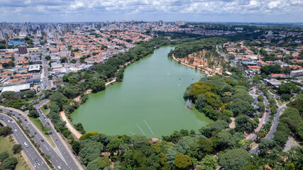Fototapeta premium Aerial view of Taquaral park in Campinas, São Paulo. In the background, the neighborhood of Cambui.